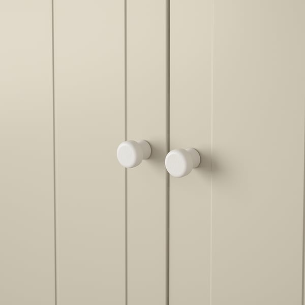 Double door knobs, sleek and modern design. White coating, securely attached. Ideal for contemporary décor.