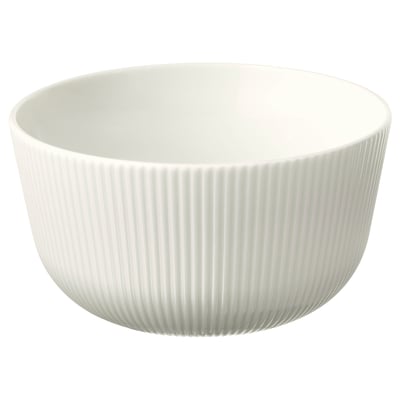 A white OFANTLIGT ceramic bowl made of feldspar porcelain, featuring vertical fluted design for grip and aesthetic appeal.