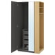 PAX black and light wood wardrobe, open showing drawers, shelves, and mirror.