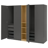 Dark gray PAX wardrobe open showing drawers and shelves.