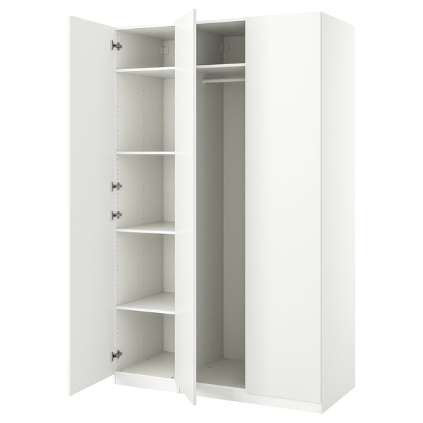 White ikea PAX wardrobe, open doors, empty shelves.