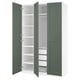 A green ikea PAX wardrobe with open doors, highlighting its adjustable shelves and drawers.