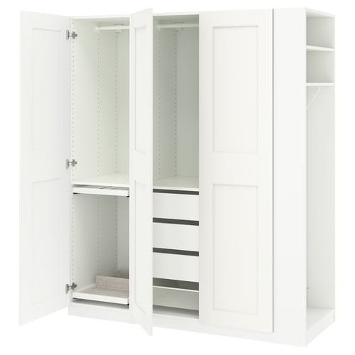 An open white PAX wardrobe with various compartments for storage.