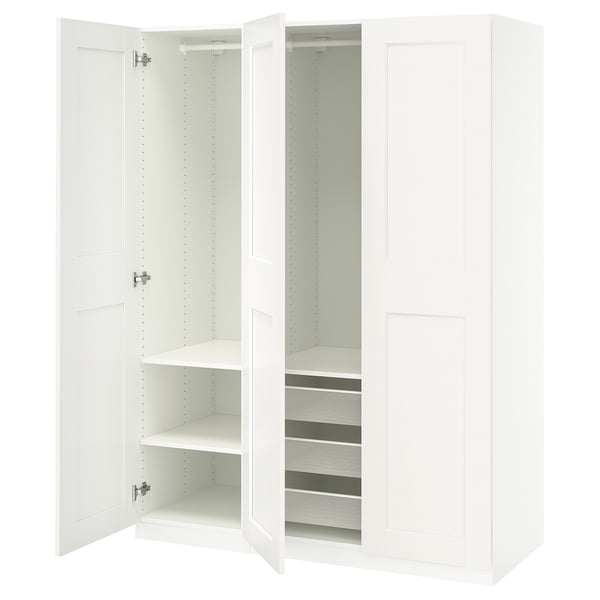 White PAX wardrobe with open doors, showing shelves, mesh drawer, and adjustable hinges.