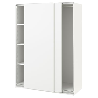 A white ikea PAX wardrobe with sliding doors. The minimalist design a simple, sleek look with clean lines and spotless white finish.