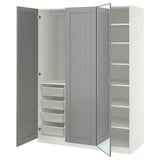 A white ikea PAX wardrobe with gray doors, one mirrored. It has an open section with shelves and mesh drawers.
