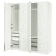 White ikea PAX wardrobe with floral design, four doors, shelves, drawers, and mesh baskets.