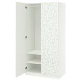 White PAX wardrobe with floral design, open doors revealing shelves.
