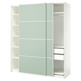 This image shows a white ikea PAX wardrobe with light green sliding doors, featuring shelves and compartments.
