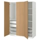 An open white and wood-colored ikea PAX wardrobe with shelves and drawers.