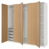 Open wooden wardrobe with interior shelves and baskets, white interior.