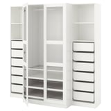 An ikea PAX wardrobe in white with open sections exposing shelves and drawers, offering ample storage solutions.