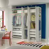 Well-organized, modern wardrobe with clothes, drawers, and shelves, featuring adjustable feet, dampened door hinges, and wall-mounting hardware.