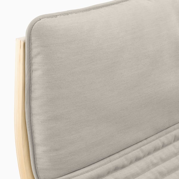 Close-up of soft, light grey cushion on a chair. Touch feels smooth and comfy.