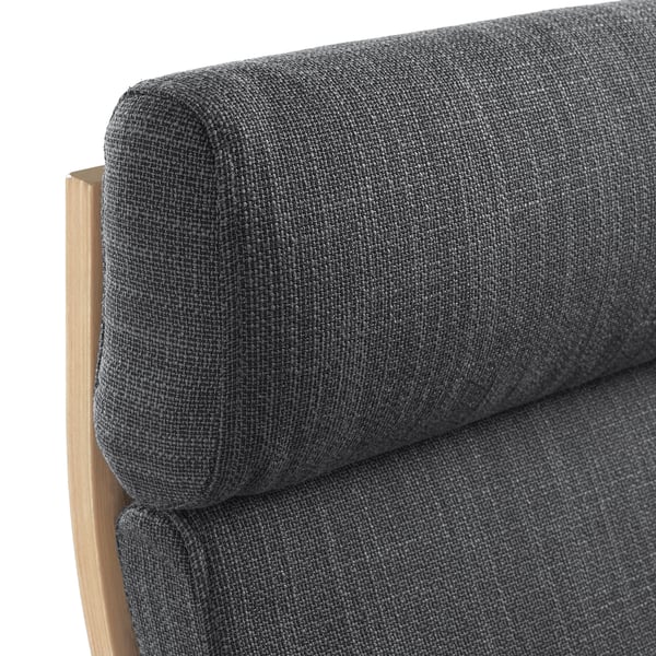 Close-up of a grey fabric sofas armrest, showcasing its soft, textured upholstery and sturdy wooden frame.