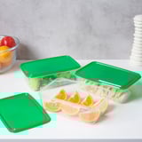 Green plastic food containers with lids, holding fruit, lettuce, and sandwiches, stackable for fridge organization.