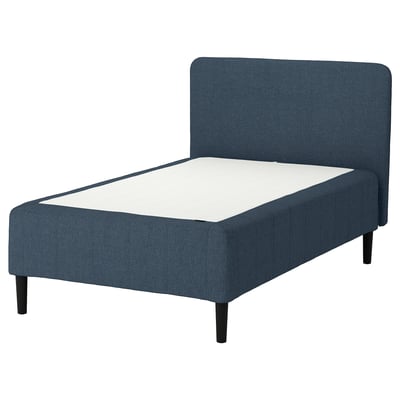 Blue RÅHOLMAR bed, sleek design with padded headboard, dark legs, white mattress.