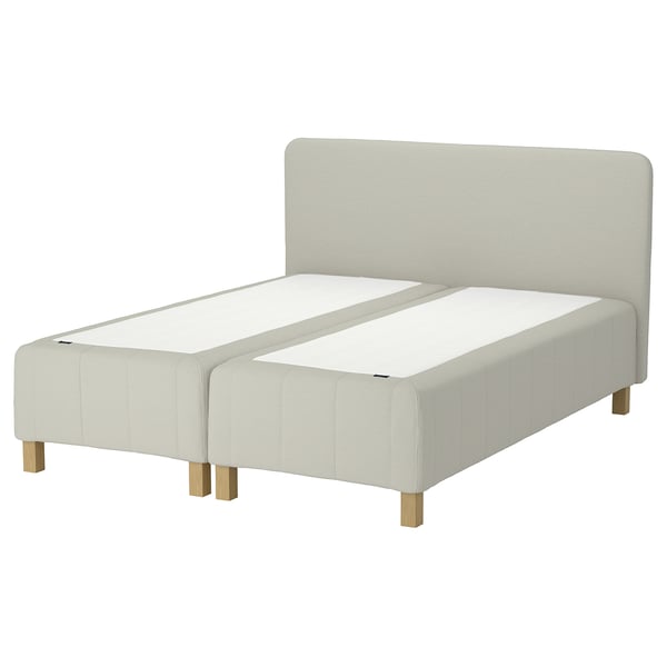 RÅHOLMAR bed in white, upholstered fabric, rectangular shape, 5 comfort zones, included headboard, wooden legs.