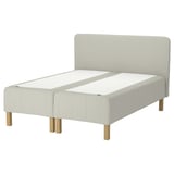 RÅHOLMAR bed, white. Upholstered headboard, wooden legs. Neutral, rectangular design.