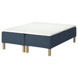 RÅHOLMAR bed base: blue cloth, wooden legs, rectangular, minimalist design.