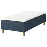 IKEA RÅHOLMAR blue bed base with white mattress, minimalist design, wooden legs.