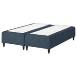 Blue RÅHOLMAR bed with 2 split mattresses, dark wooden legs.