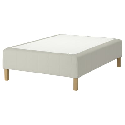 The RÅHOLMAR bed base in white, with a wooden frame for spine alignment & minimalist design.