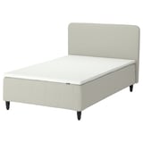 RÅHOLMAR bed with memory foam mattress, white and beige, upholstered headboard, black legs.
