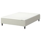 An IKEA RENFJÄLLET mattress base, white, with wooden legs and a soft mattress topper, rectangular shape.