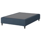 Blue fabric platform bed with dark wooden legs.