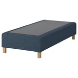The RENFJÄLLET bed base in blue fabric with wooden legs.