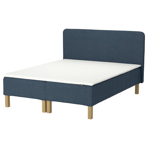 Blue RENFJÄLLET bed with white mattress, wooden legs, and curved headboard.