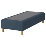 The RENFJÄLLET mattress base a blue cover with wood legs, offering comfort and support.