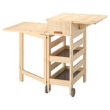 RESARÖ: mobile, light wooden drop-leaf table, perfect for dining or workspace, with shelves for storage. Natural wood finish.