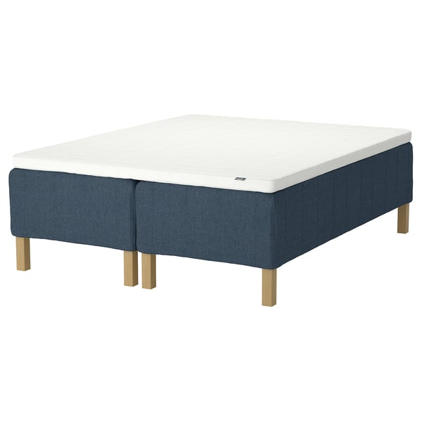 RISHÖJDEN mattress: white top, blue sides, wooden legs, supportive, zip-off cover.