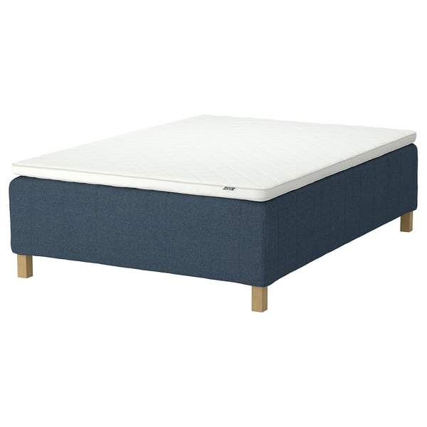 The RISHÖJDEN bed base and mattress in blue with wooden legs, featuring 7 comfort zones and a white mattress top.