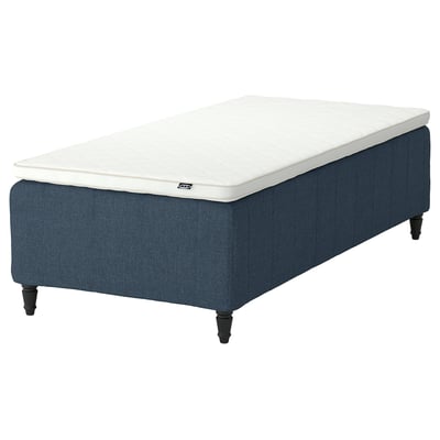 IKEA RISHÖJDEN blue bed with white mattress, wooden legs.