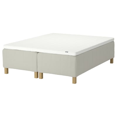 RISHÖJDEN bed: white, upholstered with wood legs, soft mattress with reinforced edges.