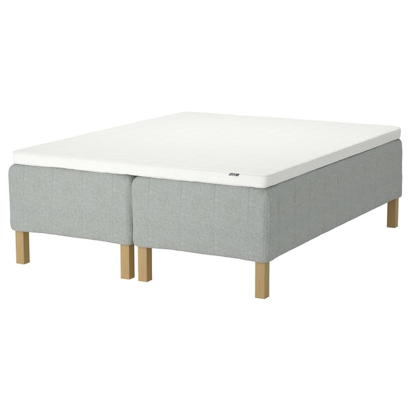 White RISHÖJDEN mattress & base, upholstered grey, wooden legs, rectangular.