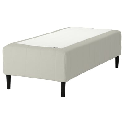 A RISHÖJDEN bed in white, featuring a tufted upholstered headboard and footboard with black wooden legs.