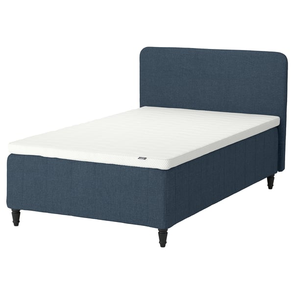 Blue RISHÖJDEN bed, foam mattress, wooden legs, soft headboard.