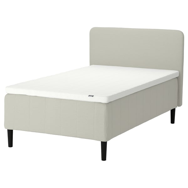 RISHÖJDEN bed: light beige, fabric-covered, upholstered headboard, 7 comfort zones mattress, black legs.