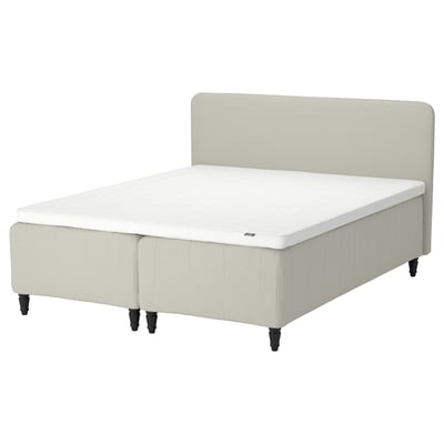 RISHÖJDEN bed, light beige, upholstered, rectangular, padded headboard, white mattress.