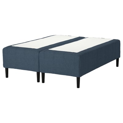 Blue fabric bed base, split design, dark wood legs, modern look.