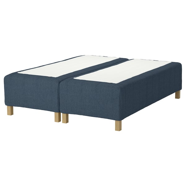 The RISHÖJDEN bed base in blue, upholstered fabric with wooden legs, displaying a rectangular shape.