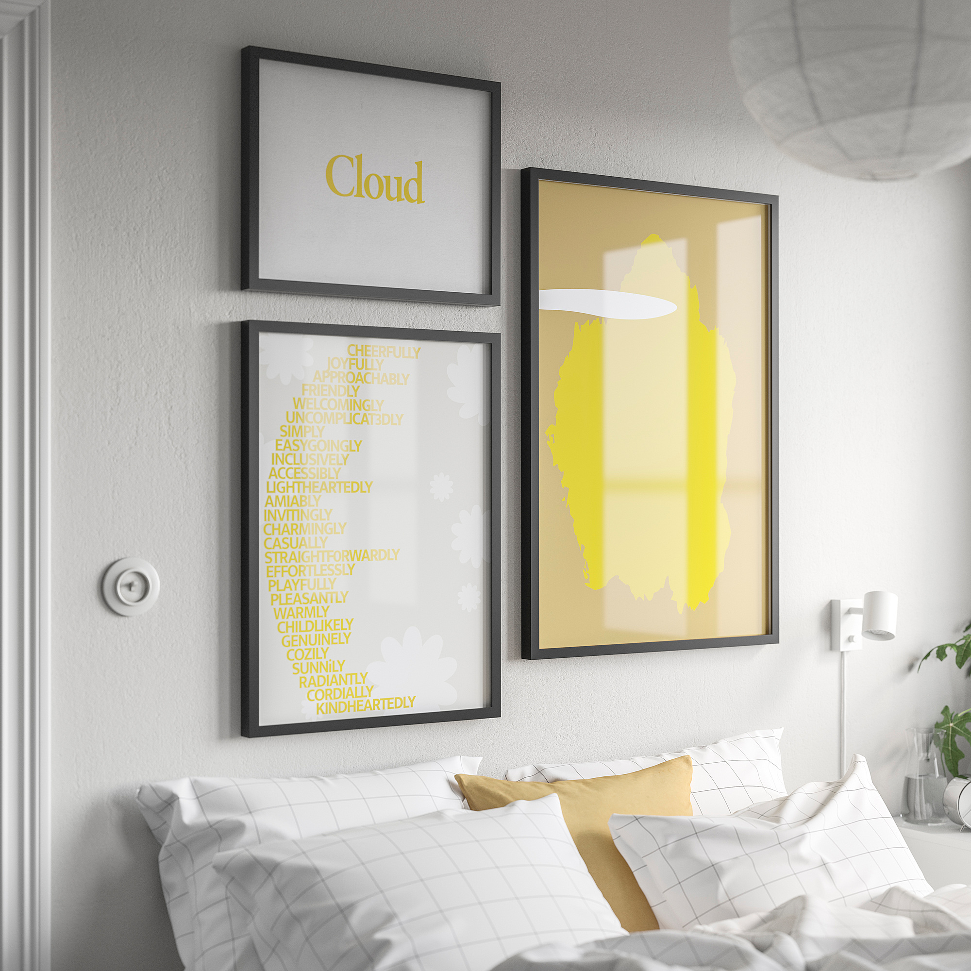 Black picture frames on wall: cloud, positive words, abstract design, sleek plastic frames, white grid pillows, yellow cushion.
