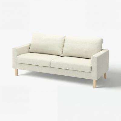 Light grey upholstered sofa, wooden legs, rectangular cushions.