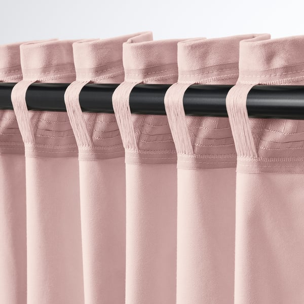 Pink velvet curtains with black rod, pleated tabs, light filter, thermal insulation.