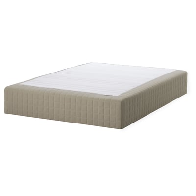 A beige SKÅRER sprung mattress. It is rectangular with a quilted outer layer.