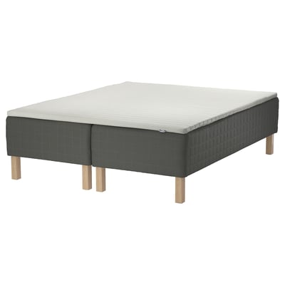SKOTTERUD bed: square-shaped, grey-green base with light grey top, upholstered in textured fabric.